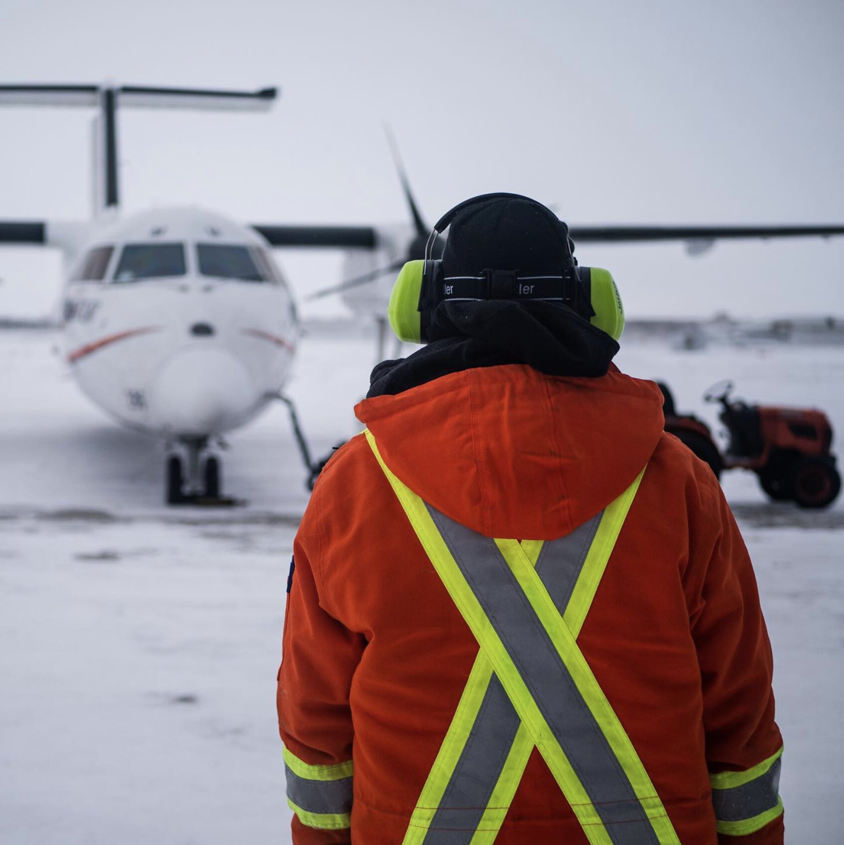 Person Standing on Runway